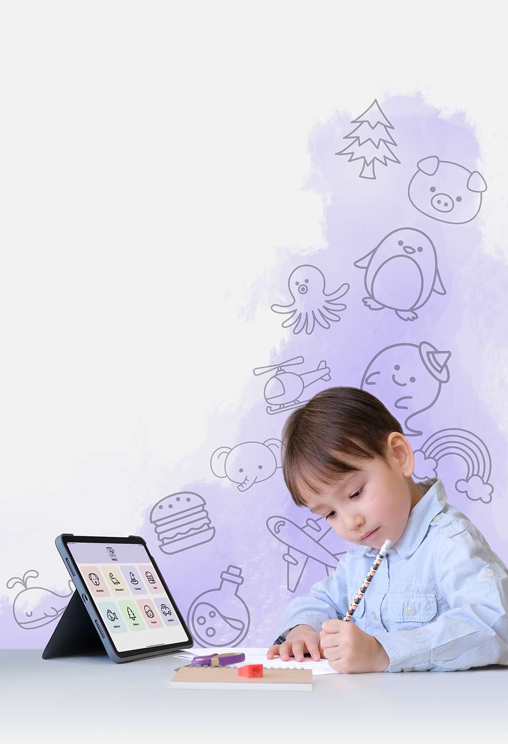 boy drawing on paper